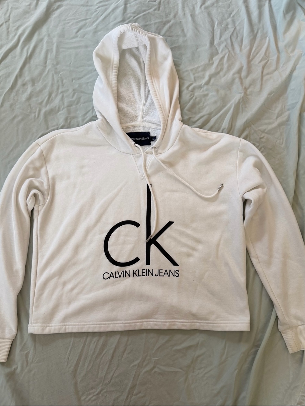 Calvin Klein Jeans White Hoodie with Black CK Logo. Size medium